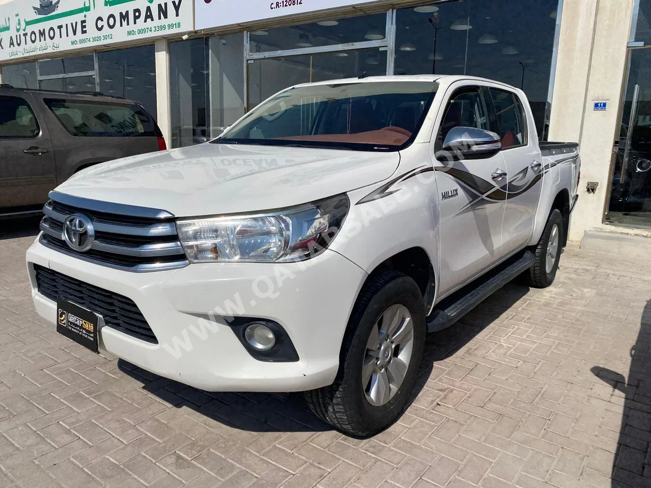 Toyota  Hilux  SR5  2017  Automatic  97,000 Km  4 Cylinder  Four Wheel Drive (4WD)  Pick Up  White