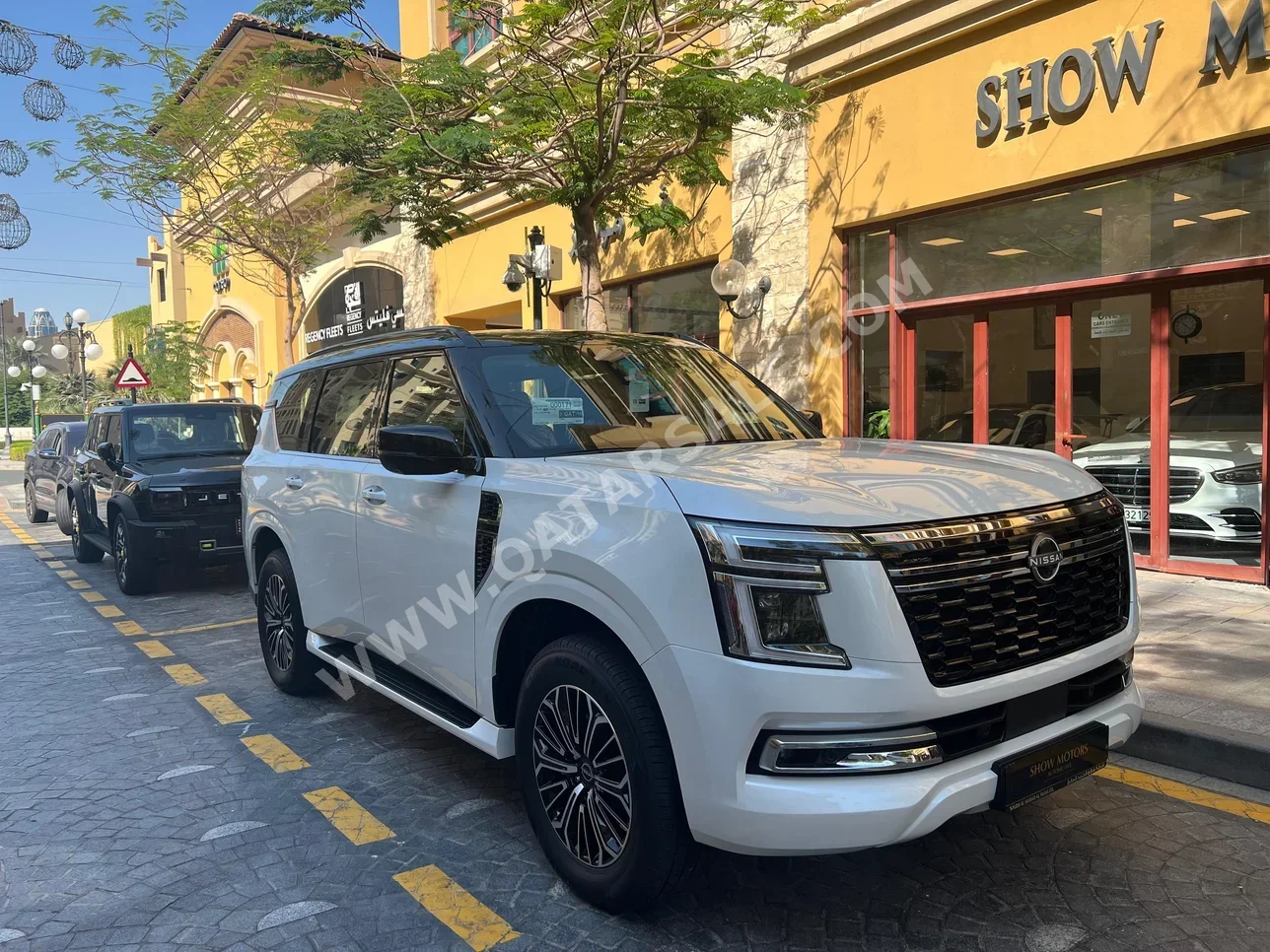 Nissan  Patrol  Platinum  2025  Automatic  0 Km  6 Cylinder  Four Wheel Drive (4WD)  SUV  White  With Warranty