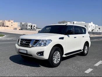 Nissan  Patrol  XE  2018  Automatic  59,000 Km  6 Cylinder  Four Wheel Drive (4WD)  SUV  White