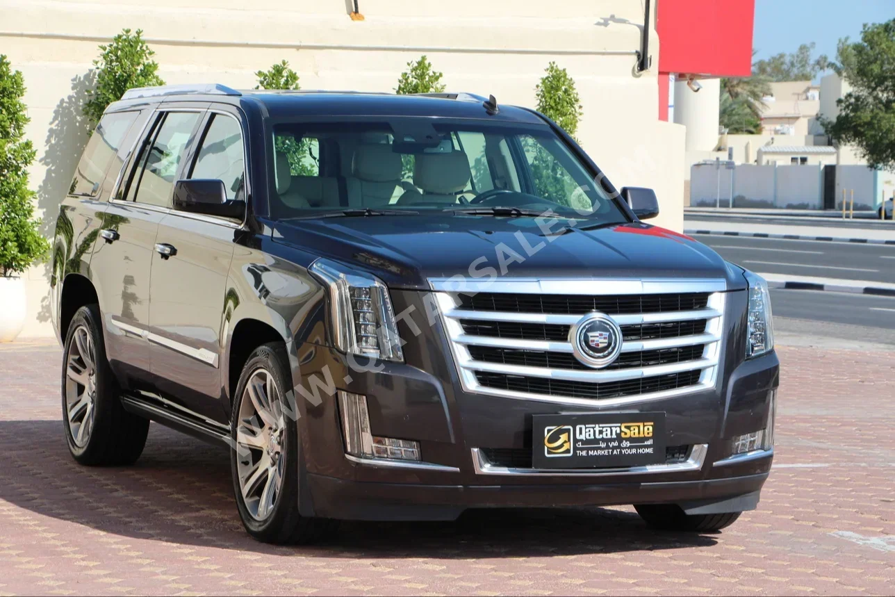 Cadillac  Escalade  Platinum  2015  Automatic  163,000 Km  8 Cylinder  Four Wheel Drive (4WD)  SUV  Gray