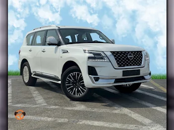 Nissan  Patrol  Platinum  2024  Automatic  0 Km  8 Cylinder  Four Wheel Drive (4WD)  SUV  White  With Warranty