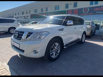 Nissan  Patrol  SE  2012  Automatic  309,000 Km  8 Cylinder  Four Wheel Drive (4WD)  SUV  White