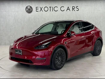 Tesla  Model Y  2024  Automatic  1,000 Km  0 Cylinder  All Wheel Drive (AWD)  SUV  Red