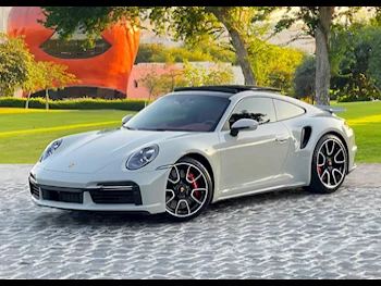 Porsche  911  Turbo S  2022  Automatic  26,000 Km  6 Cylinder  Rear Wheel Drive (RWD)  Coupe / Sport  Gray  With Warranty