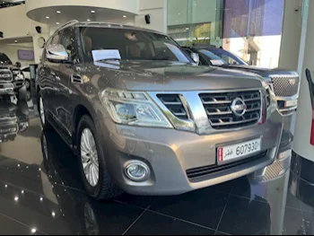 Nissan  Patrol  Platinum  2014  Automatic  135٬000 Km  8 Cylinder  Four Wheel Drive (4WD)  SUV  Bronze