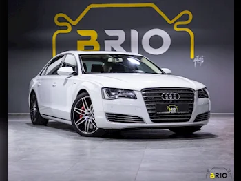 Audi  A8  W12 Quattro  2014  Automatic  91,000 Km  12 Cylinder  All Wheel Drive (AWD)  Sedan  White