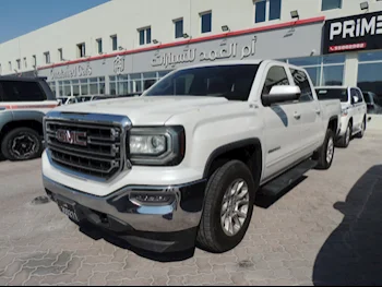 GMC  Sierra  SLE  2016  Automatic  169,000 Km  8 Cylinder  Four Wheel Drive (4WD)  Pick Up  White