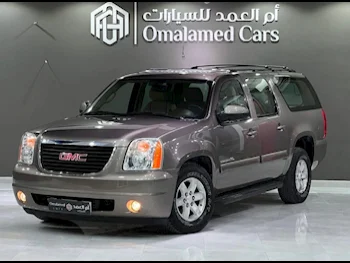 GMC  Yukon  SLE  2012  Automatic  274,000 Km  8 Cylinder  Rear Wheel Drive (RWD)  SUV  Gray