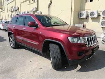 Jeep  Grand Cherokee  2012  Automatic  242,000 Km  6 Cylinder  Four Wheel Drive (4WD)  SUV  Maroon