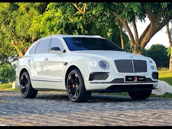 Bentley  Bentayga  2018  Automatic  40,000 Km  12 Cylinder  Four Wheel Drive (4WD)  SUV  White