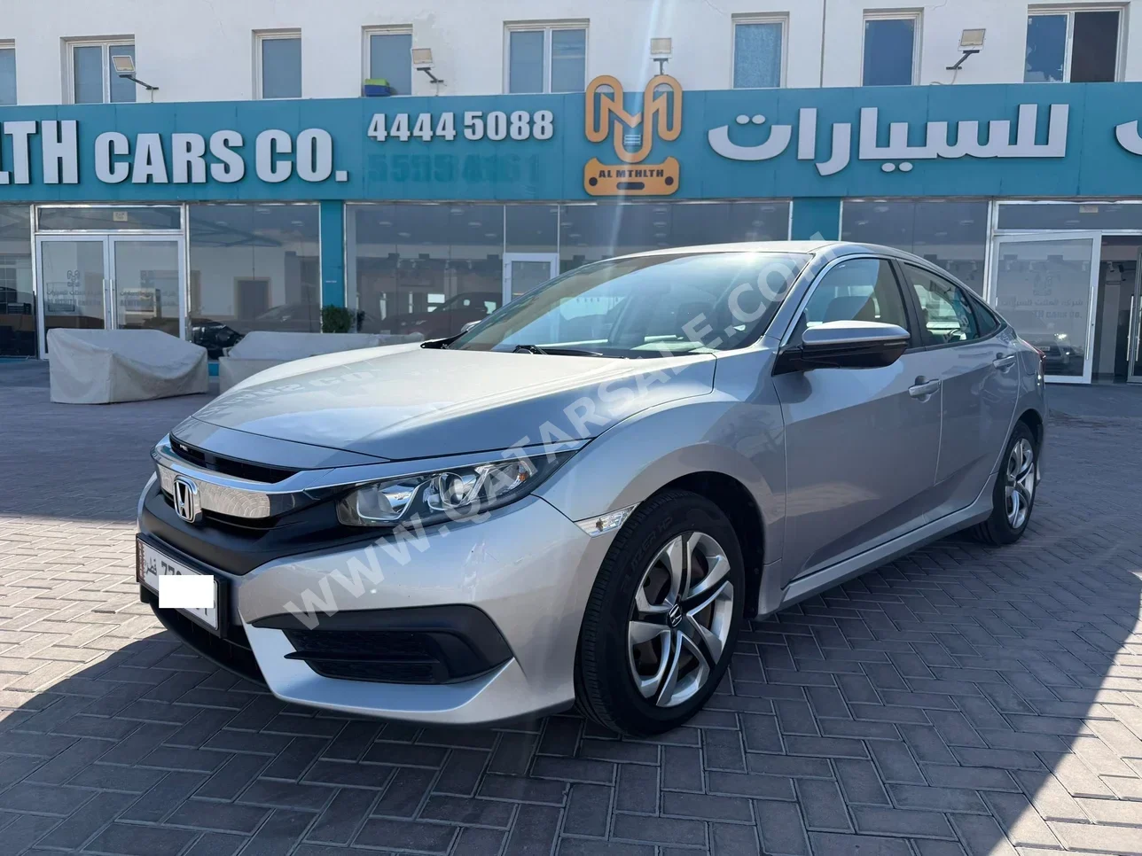 Honda  Civic  2017  Automatic  96,000 Km  4 Cylinder  Front Wheel Drive (FWD)  Sedan  Silver