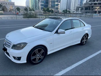 Mercedes-Benz  C-Class  200  2014  Automatic  91,000 Km  4 Cylinder  Rear Wheel Drive (RWD)  Sedan  White