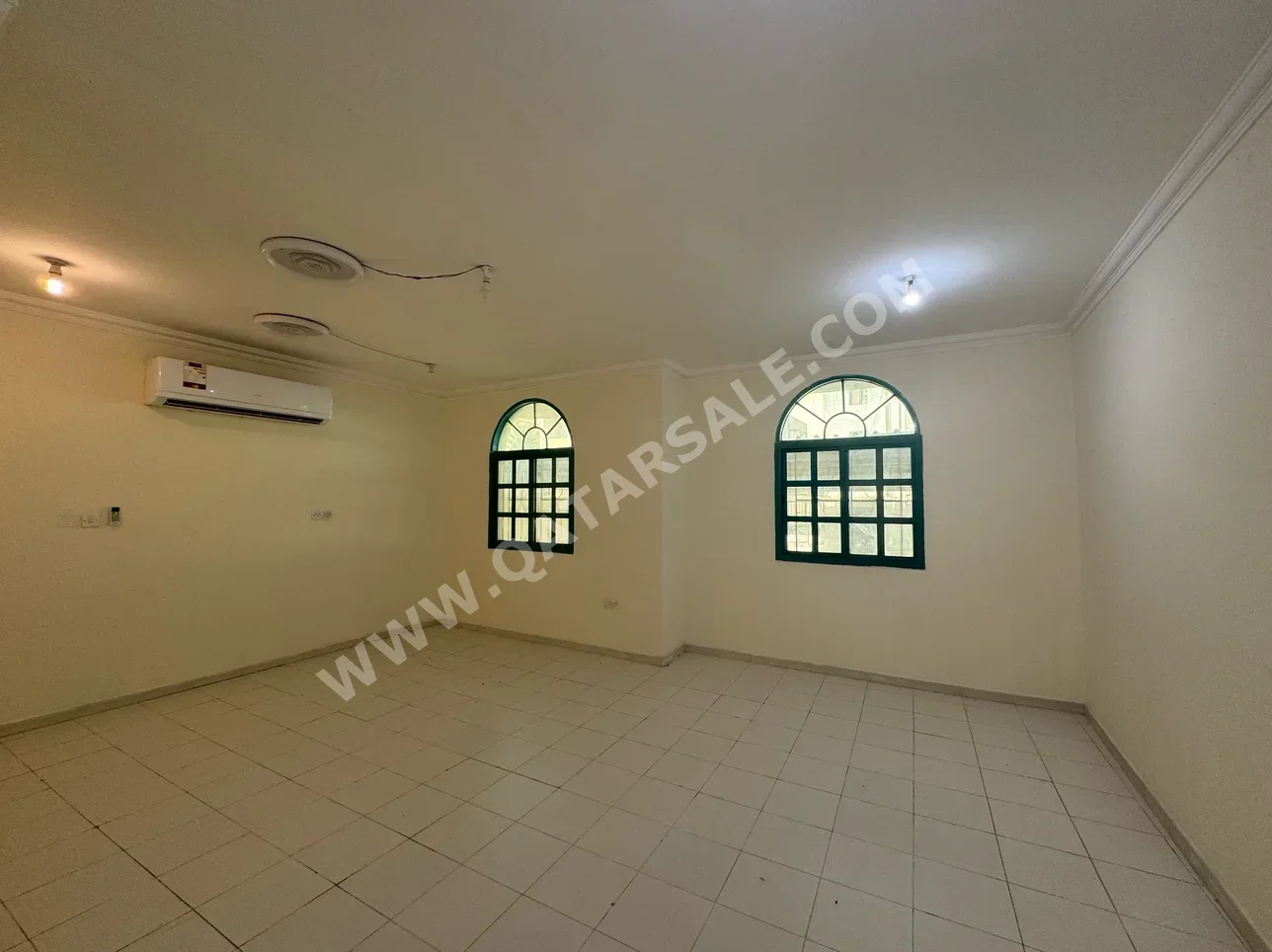 2 Bedrooms  Apartment  For Rent  in Doha -  Madinat Khalifa South  Not Furnished