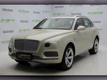 Bentley  Bentayga  2020  Automatic  24٬000 Km  8 Cylinder  Four Wheel Drive (4WD)  SUV  Beige  With Warranty