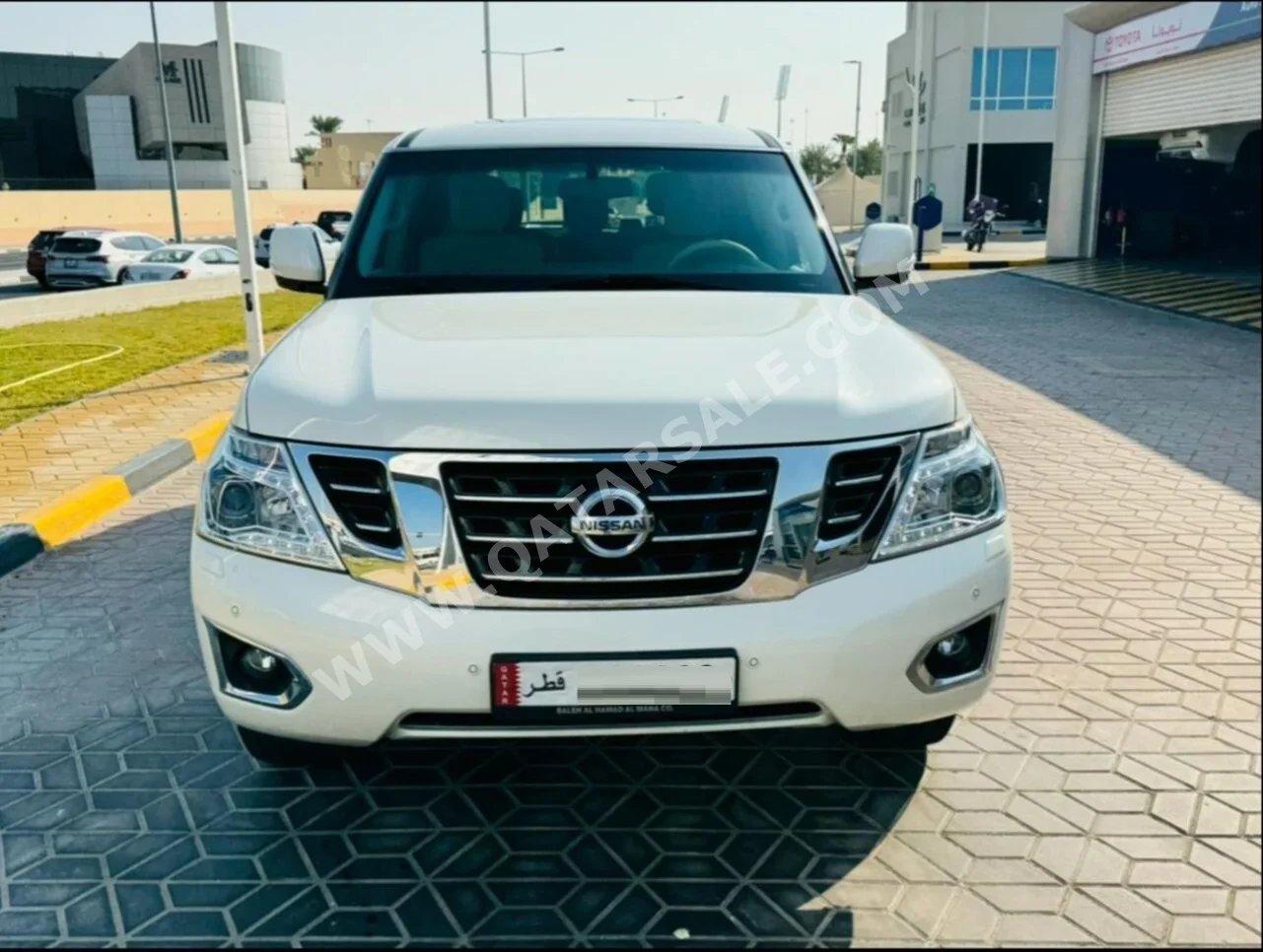 Nissan  Patrol  SE  2016  Automatic  203٬000 Km  8 Cylinder  Four Wheel Drive (4WD)  SUV  White