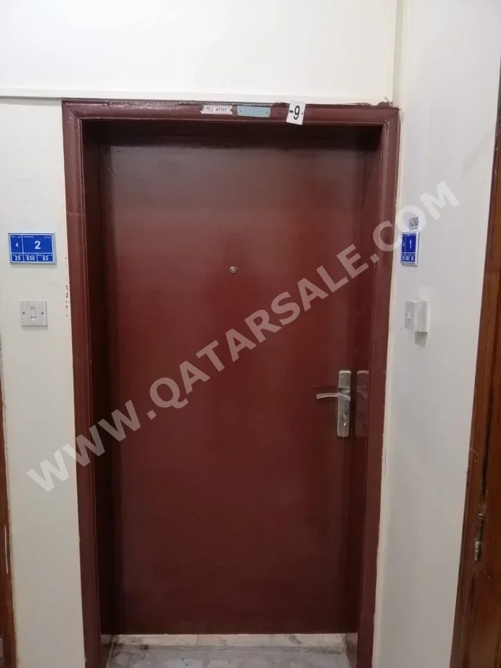 3 Bedrooms  Apartment  in Doha -  Al Mansoura  Not Furnished