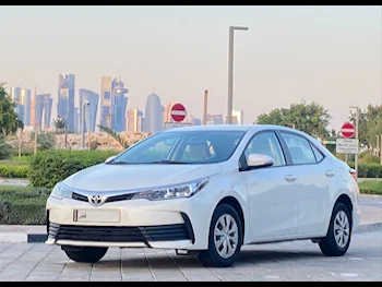 Toyota  Corolla  XLI  2019  Automatic  110,000 Km  4 Cylinder  Front Wheel Drive (FWD)  Sedan  White  With Warranty