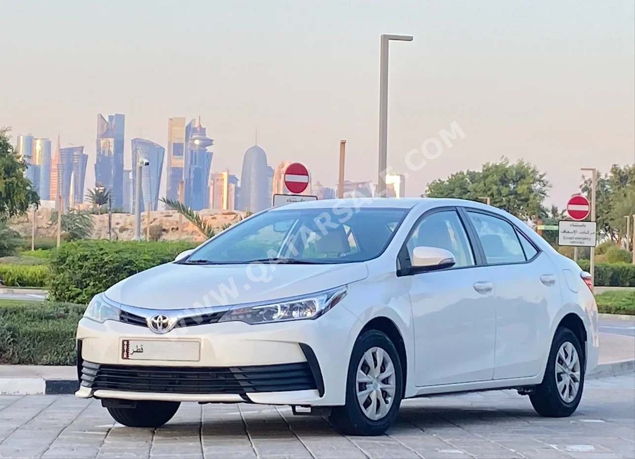 Toyota  Corolla  XLI  2019  Automatic  110,000 Km  4 Cylinder  Front Wheel Drive (FWD)  Sedan  White  With Warranty