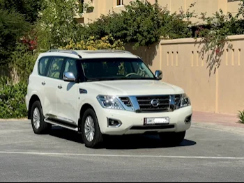 Nissan  Patrol  LE  2014  Automatic  240,000 Km  8 Cylinder  Four Wheel Drive (4WD)  SUV  White