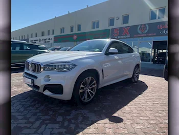 BMW  X-Series  X6 M50i  2016  Automatic  113,000 Km  8 Cylinder  Four Wheel Drive (4WD)  SUV  White