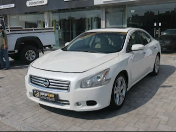 Nissan  Maxima  2012  Automatic  280,000 Km  6 Cylinder  Rear Wheel Drive (RWD)  Sedan  White