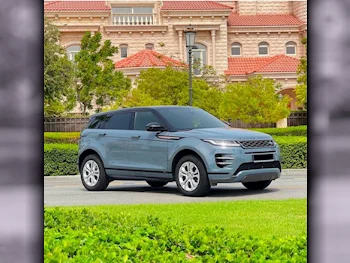 Land Rover  Evoque  R-Dynamic  2021  Automatic  30,500 Km  4 Cylinder  All Wheel Drive (AWD)  Coupe / Sport  Gray  With Warranty