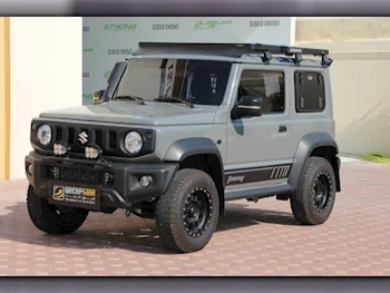 Suzuki  Jimny  2021  Automatic  7,000 Km  4 Cylinder  Four Wheel Drive (4WD)  SUV  Gray  With Warranty