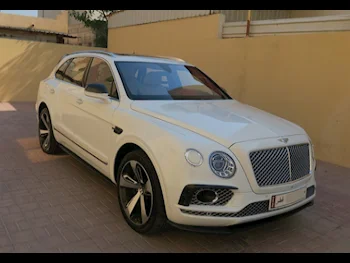 Bentley  Bentayga  2017  Automatic  62,000 Km  12 Cylinder  Four Wheel Drive (4WD)  SUV  White