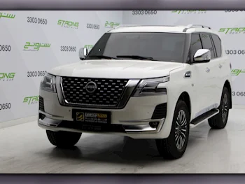 Nissan  Patrol  Platinum  2015  Automatic  125,000 Km  8 Cylinder  Four Wheel Drive (4WD)  SUV  White