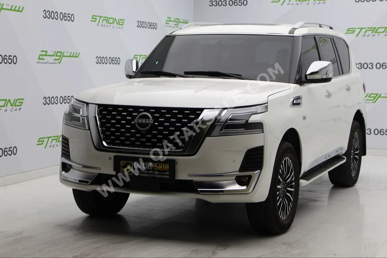 Nissan  Patrol  Platinum  2015  Automatic  125,000 Km  8 Cylinder  Four Wheel Drive (4WD)  SUV  White