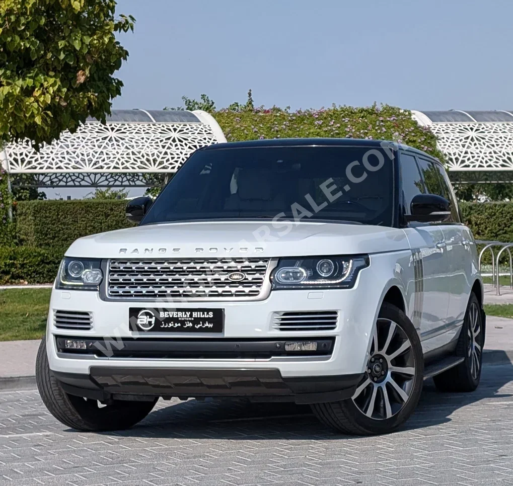 Land Rover  Range Rover  Vogue SE Super charged  2013  Automatic  235,125 Km  8 Cylinder  Four Wheel Drive (4WD)  SUV  White