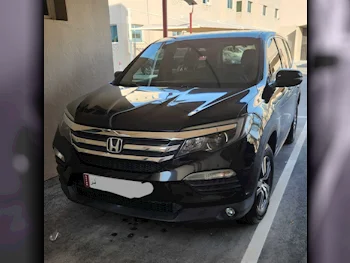 Honda  Pilot  2016  Automatic  145,000 Km  4 Cylinder  Four Wheel Drive (4WD)  SUV  Black