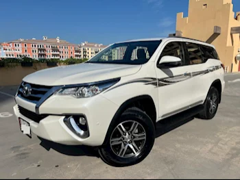 Toyota  Fortuner  2019  Automatic  104,000 Km  6 Cylinder  Four Wheel Drive (4WD)  SUV  White