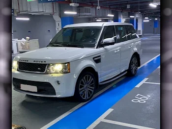 Land Rover  Range Rover  Sport HSE  2013  Automatic  125,000 Km  8 Cylinder  Four Wheel Drive (4WD)  SUV  White