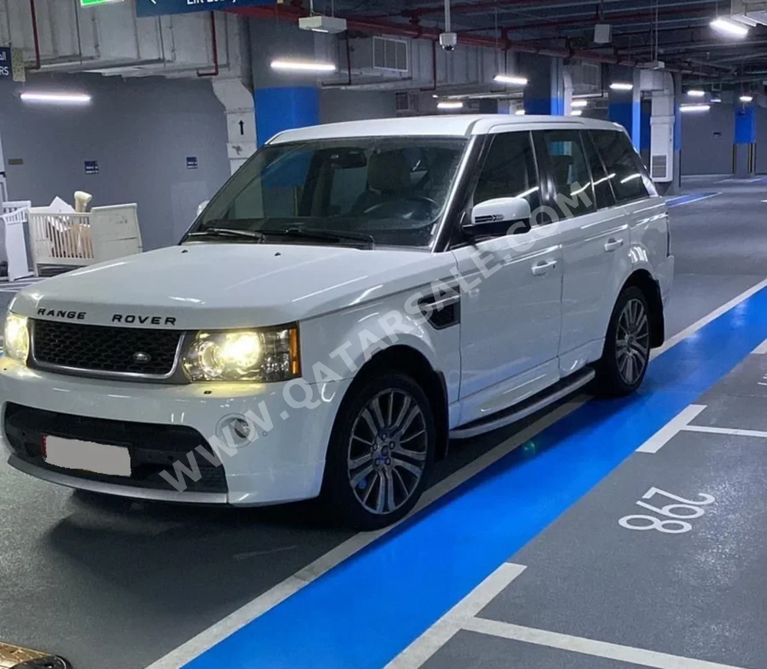 Land Rover  Range Rover  Sport HSE  2013  Automatic  125,000 Km  8 Cylinder  Four Wheel Drive (4WD)  SUV  White