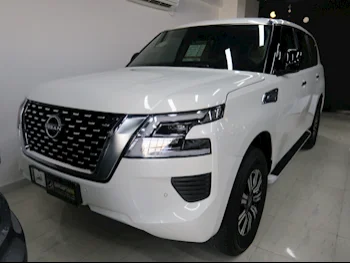 Nissan  Patrol  XE  2023  Automatic  8,000 Km  8 Cylinder  Four Wheel Drive (4WD)  SUV  White  With Warranty