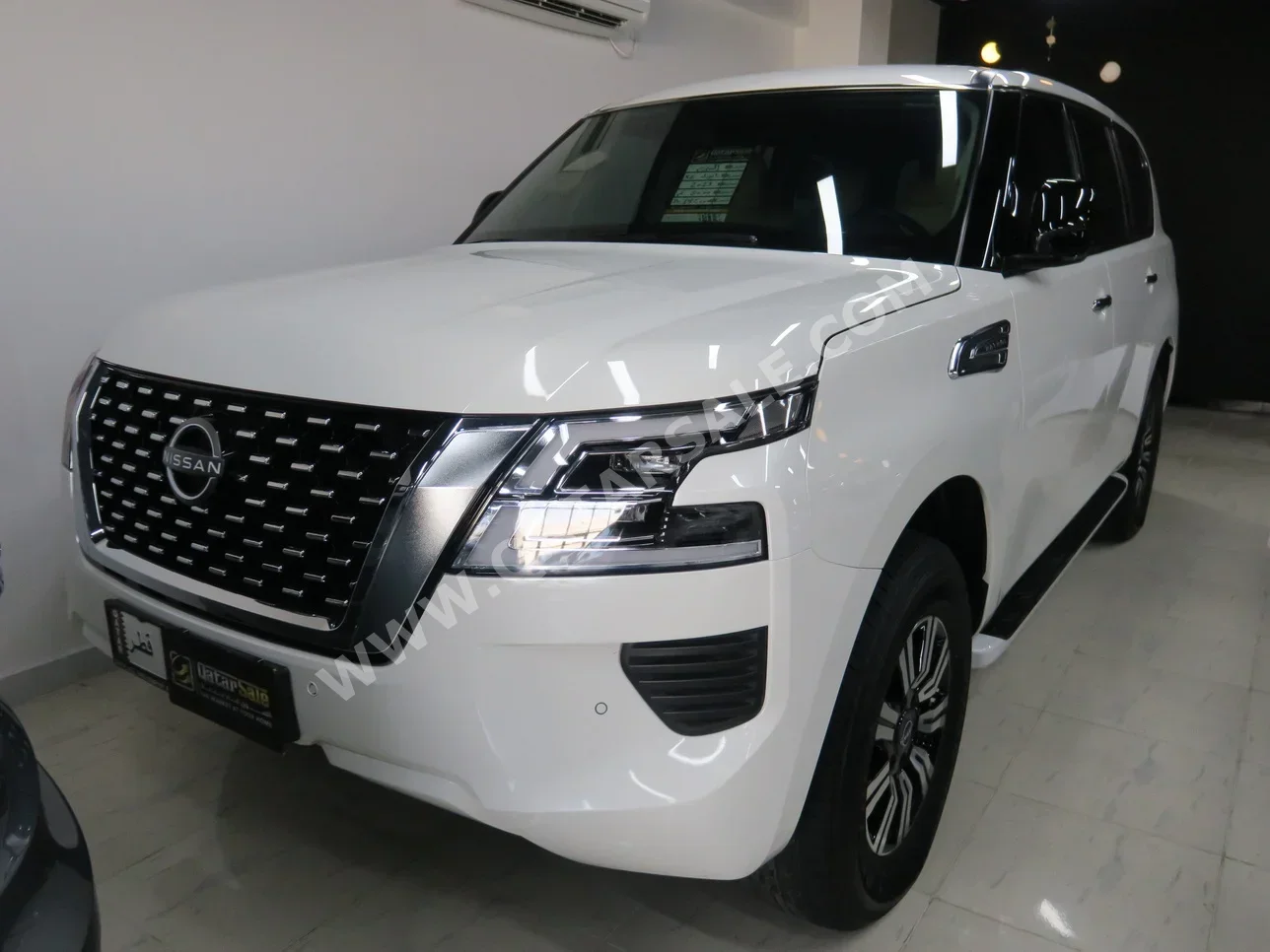 Nissan  Patrol  XE  2023  Automatic  8,000 Km  8 Cylinder  Four Wheel Drive (4WD)  SUV  White  With Warranty