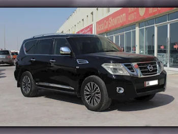 Nissan  Patrol  Platinum  2015  Automatic  209,000 Km  8 Cylinder  Four Wheel Drive (4WD)  SUV  Black