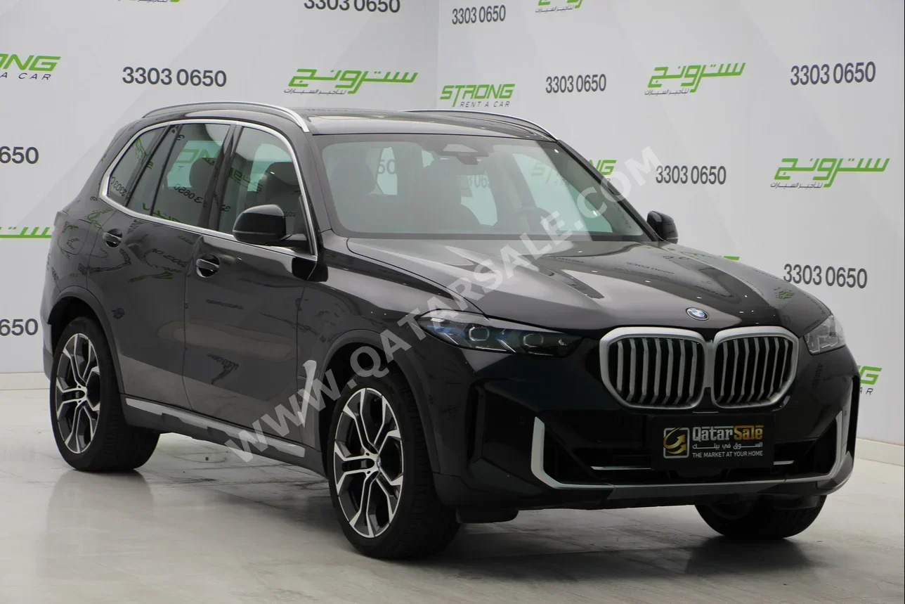 BMW  X-Series  X5  2024  Automatic  8,400 Km  6 Cylinder  Four Wheel Drive (4WD)  SUV  Black  With Warranty