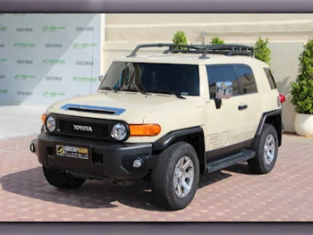 Toyota  FJ Cruiser  2023  Automatic  14,000 Km  6 Cylinder  Four Wheel Drive (4WD)  SUV  Beige  With Warranty