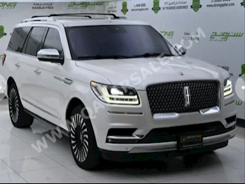 Lincoln  Navigator  2018  Automatic  98,000 Km  6 Cylinder  Four Wheel Drive (4WD)  SUV  White  With Warranty