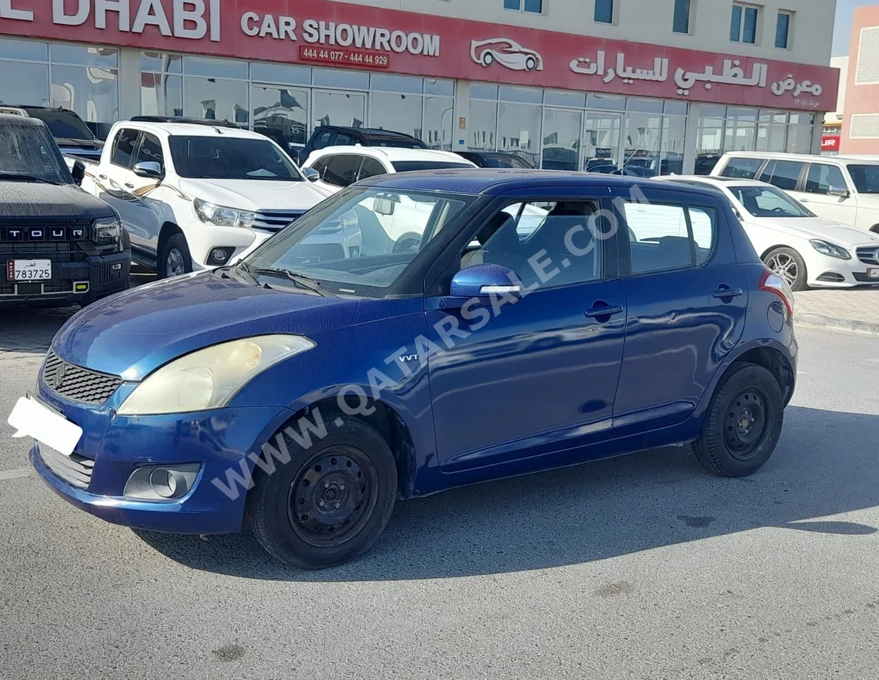 Suzuki  Swift  2014  Automatic  141,000 Km  4 Cylinder  Front Wheel Drive (FWD)  Hatchback  Blue