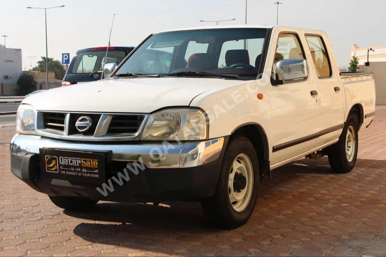 نيسان بيك أب 2006 عادي 399,000 كم 4 سلندر دفع خلفي بيكب أبيض