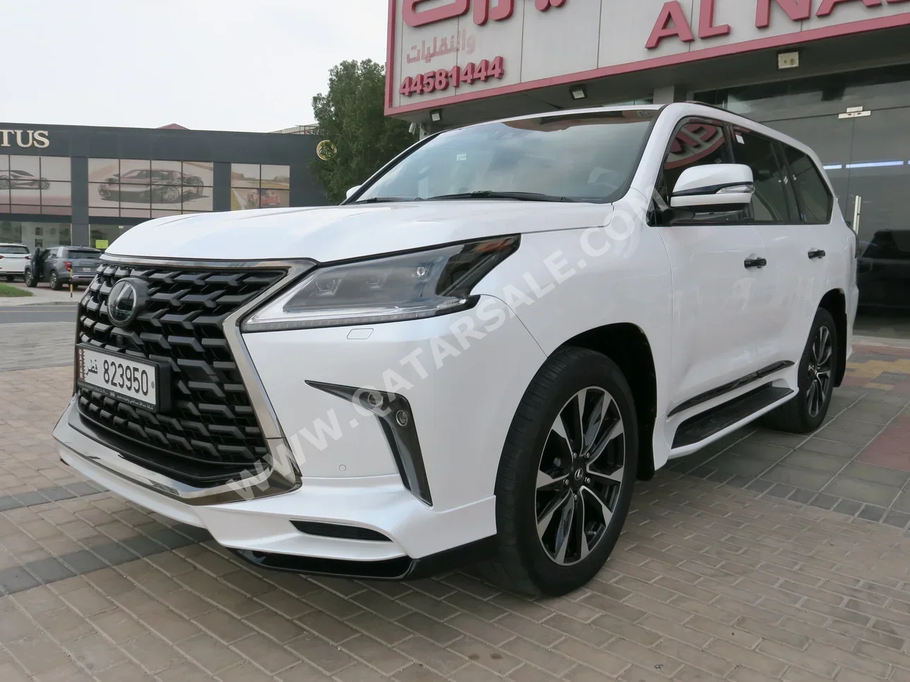  Lexus  LX  570 S Black Edition  2021  Automatic  32,000 Km  8 Cylinder  Four Wheel Drive (4WD)  SUV  White  With Warranty