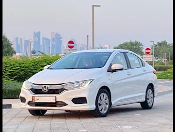 Honda  City  2020  Automatic  148,000 Km  4 Cylinder  Front Wheel Drive (FWD)  Sedan  White