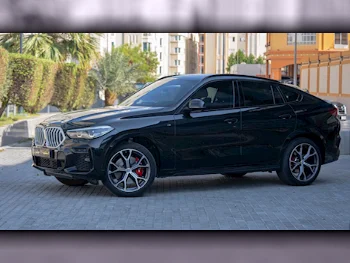 BMW  X-Series  X6  2023  Automatic  11٬000 Km  6 Cylinder  Four Wheel Drive (4WD)  SUV  Black  With Warranty