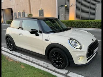 Mini  Cooper  2021  Automatic  43,000 Km  3 Cylinder  Front Wheel Drive (FWD)  Hatchback  White  With Warranty