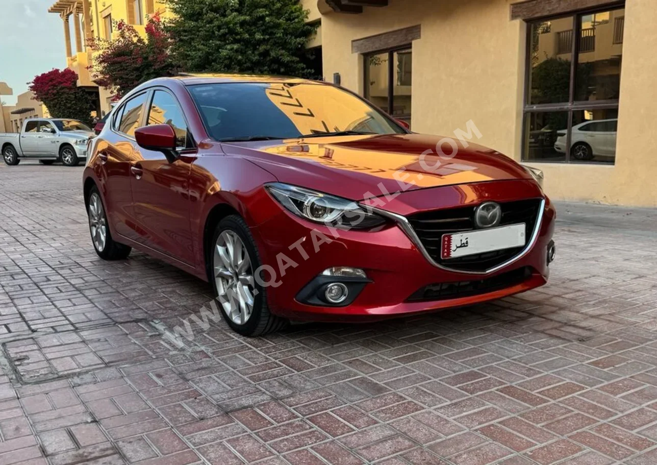 Mazda  Mazda 3  2015  Automatic  145,000 Km  4 Cylinder  Front Wheel Drive (FWD)  Hatchback  Red