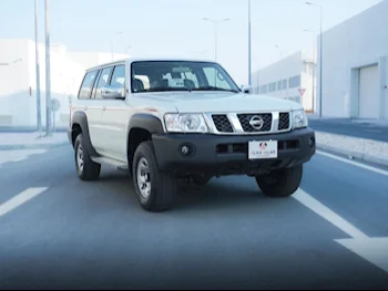 Nissan  Patrol  GL  2023  Automatic  0 Km  6 Cylinder  Four Wheel Drive (4WD)  SUV  White  With Warranty