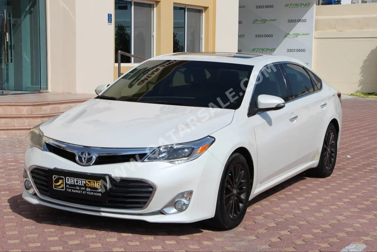 Toyota  Avalon  Limited  2014  Automatic  161,000 Km  6 Cylinder  Front Wheel Drive (FWD)  Sedan  White